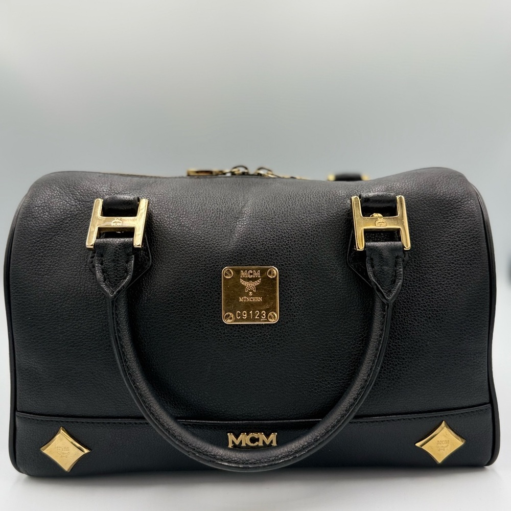 MCM Black Leather Shoulder Bag with Gold Hardware Accents